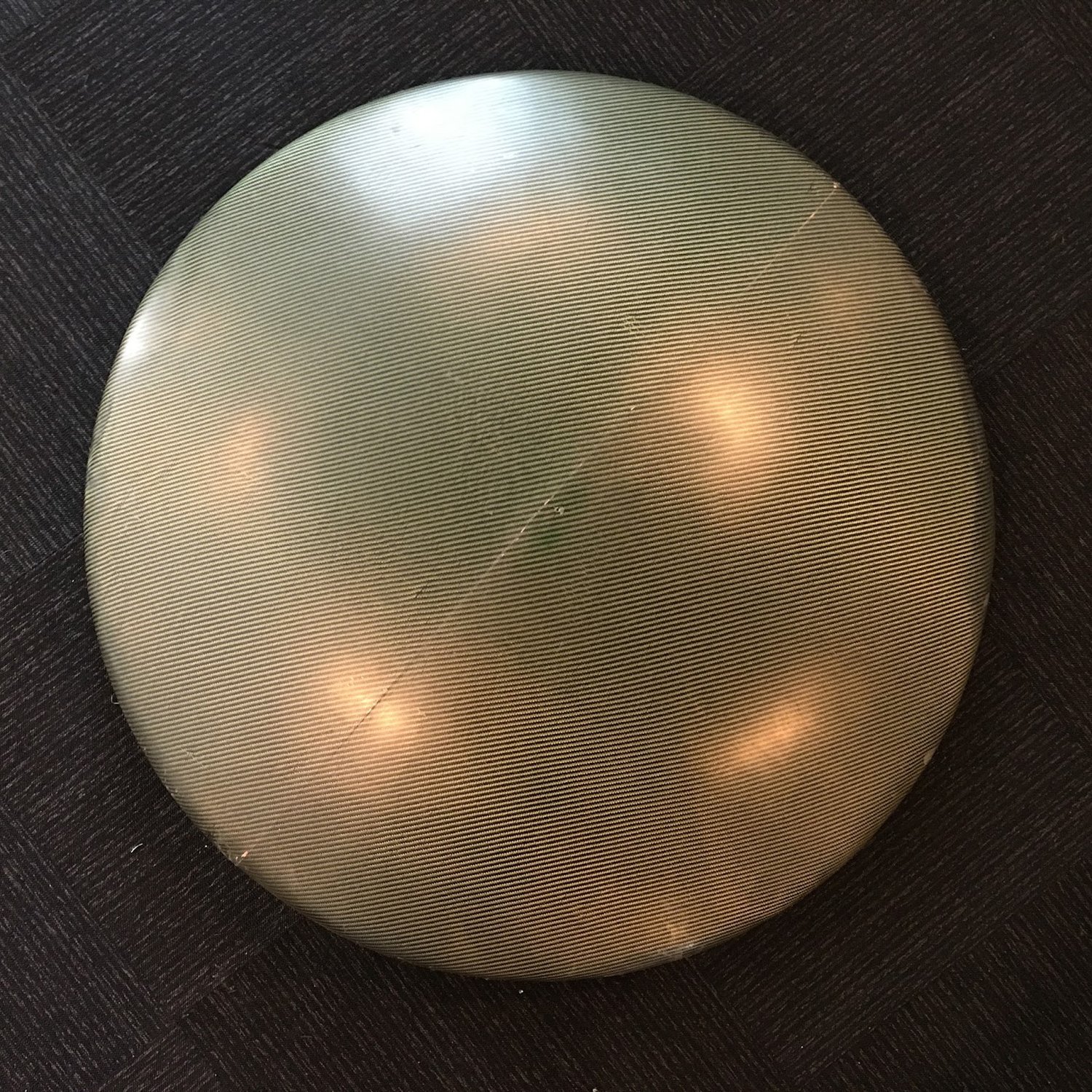 Finished lower aeroshell. Mold parting line is visible and will be sanded out and polished. This part is 1 meter in diameter.