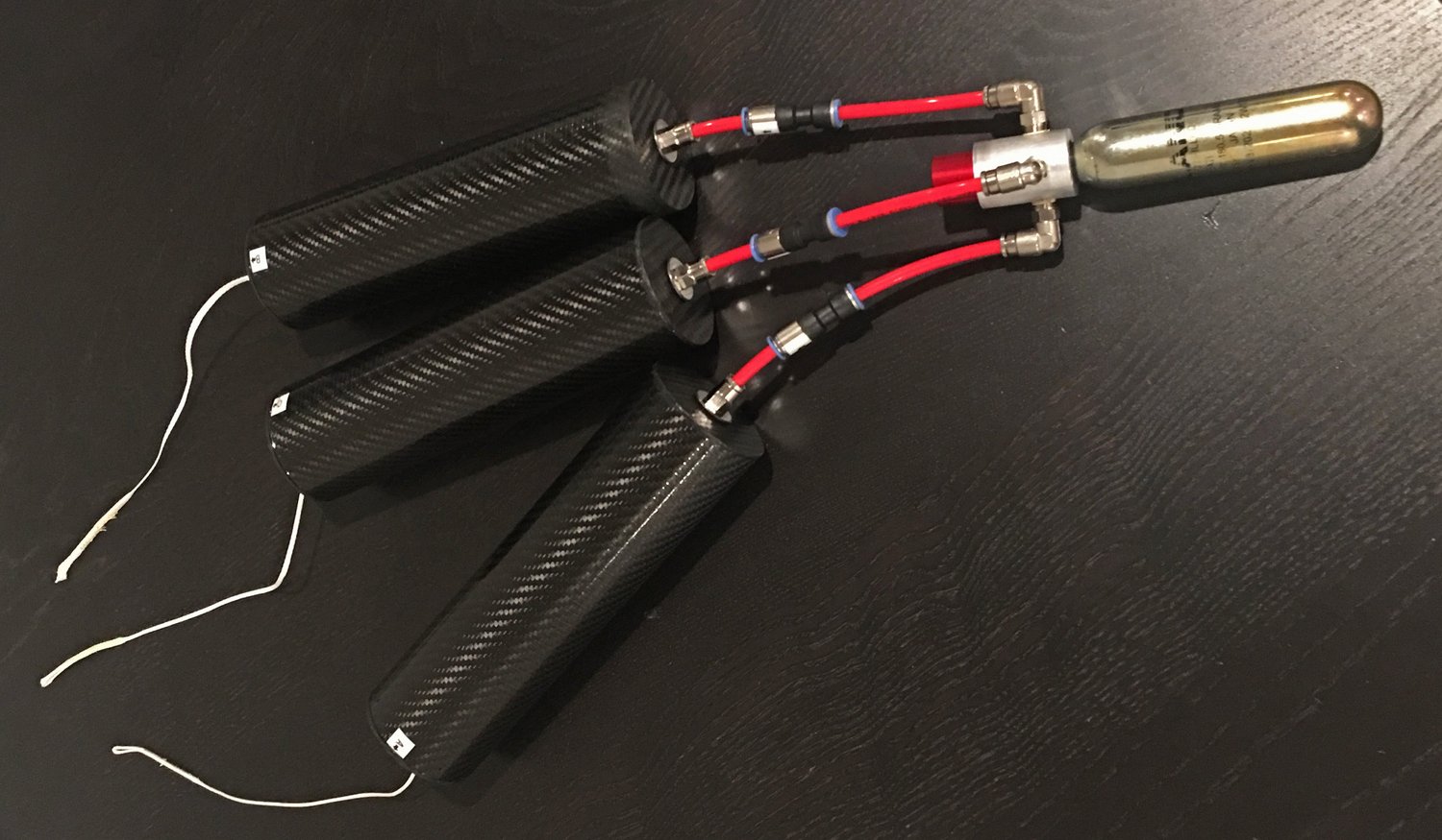 Parachutes packed into carbon fiber mortars